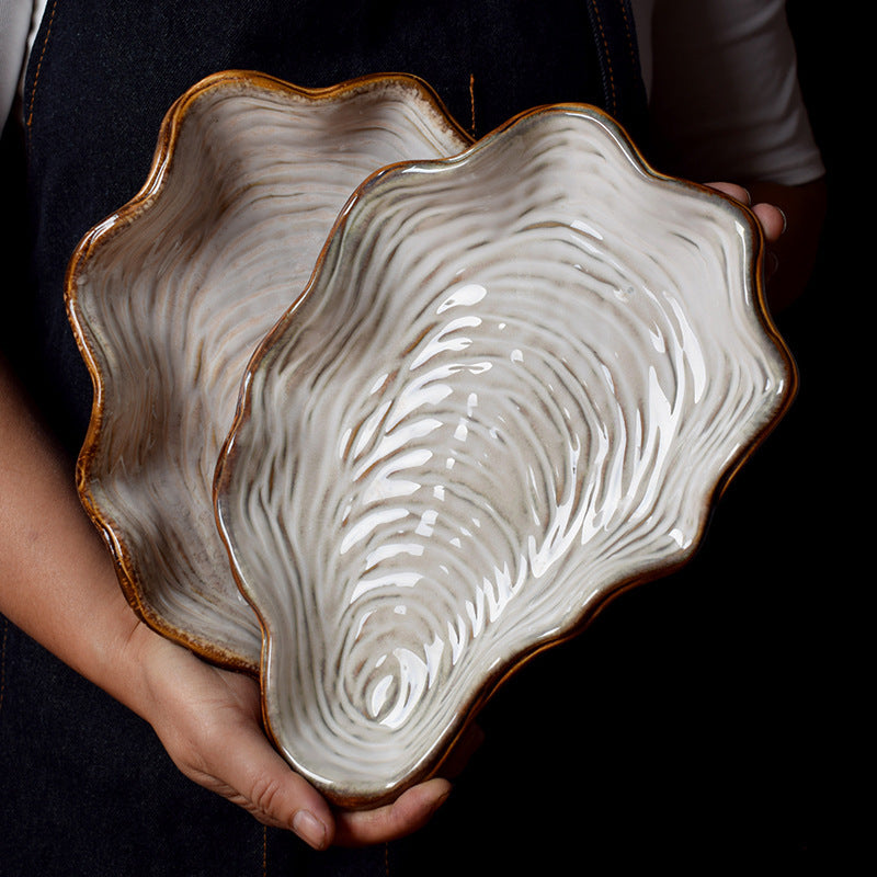 Shaped shell plate