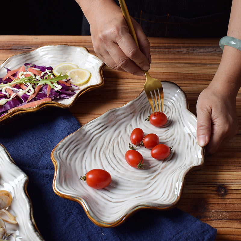 Shaped shell plate